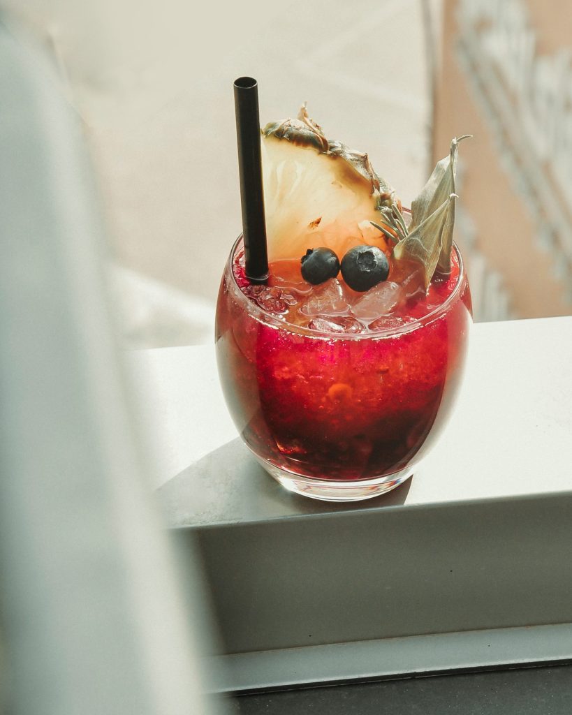 a glass with a drink in it
